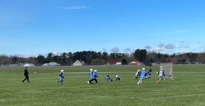 Most people would have this view of a lacrosse game. Heather said she loves taking photos so she can enlarge them to better see what they depict.